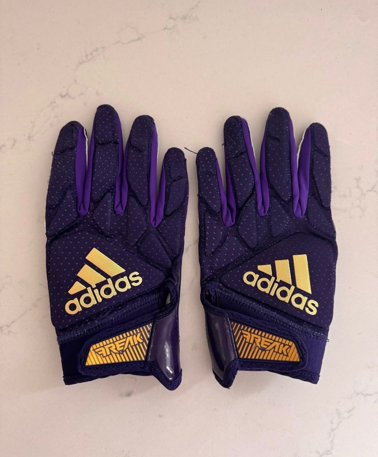 Football gloves for the Washington UW Huskies